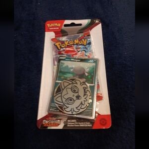 Pokémon card pack with coin